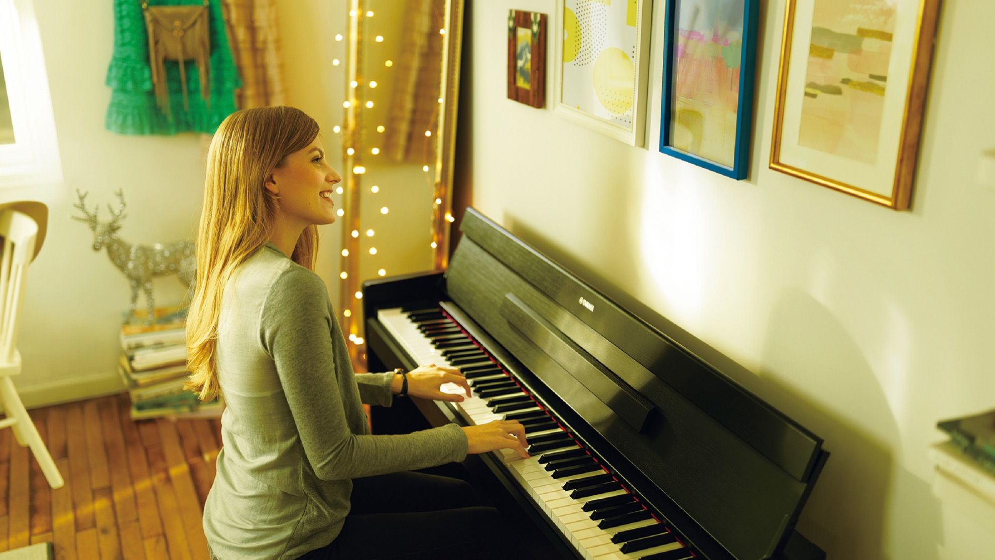 Woman playing a Yamaha YDP-S34 digital piano