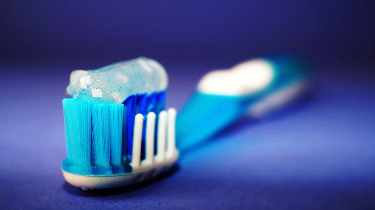 Close-up of a toothbrush with toothpaste
