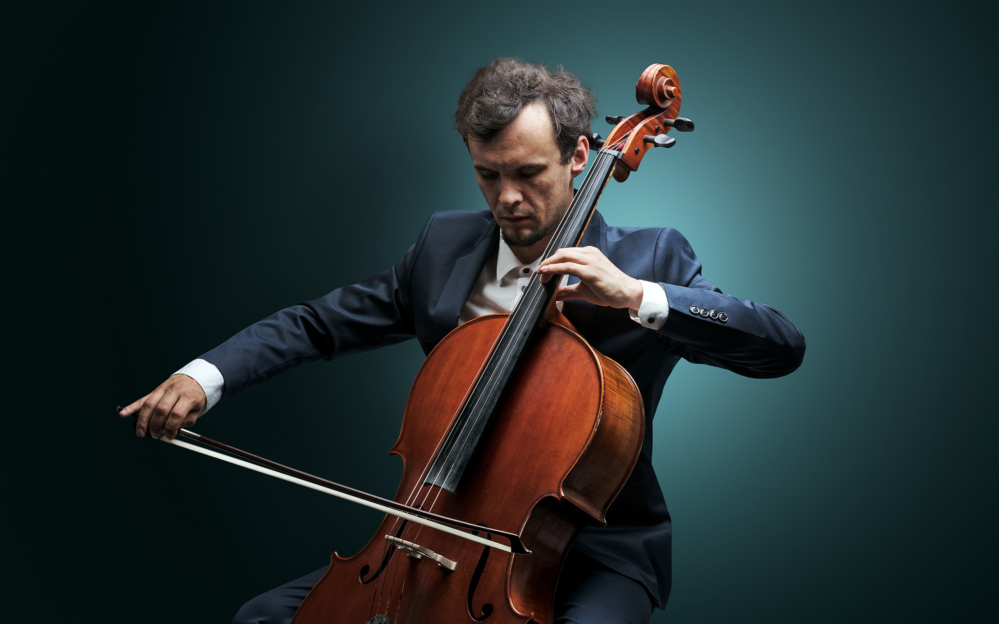 A man playing a cello