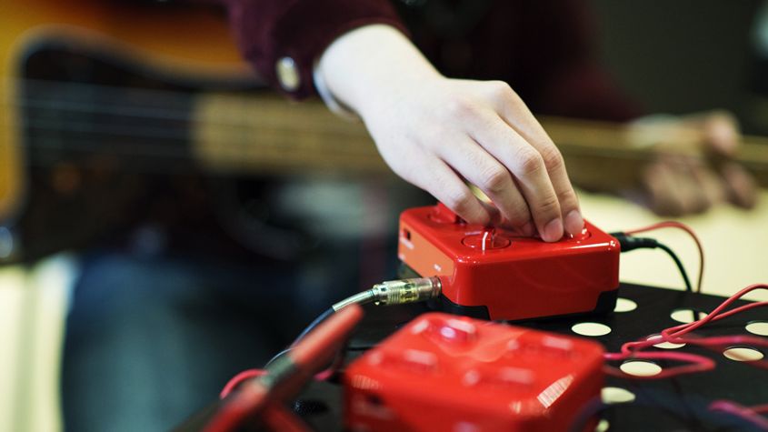 Photo of the SessionCake being used a guitar